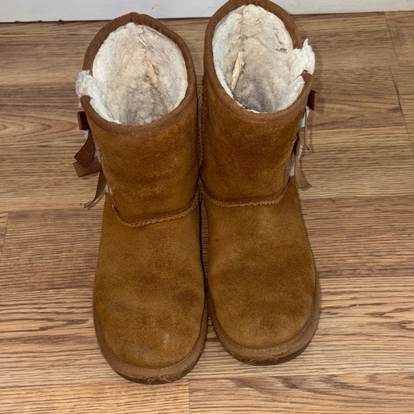 Warm Tan Koolaburra Kids Boots with Bow Accents - Picture 2 of 8